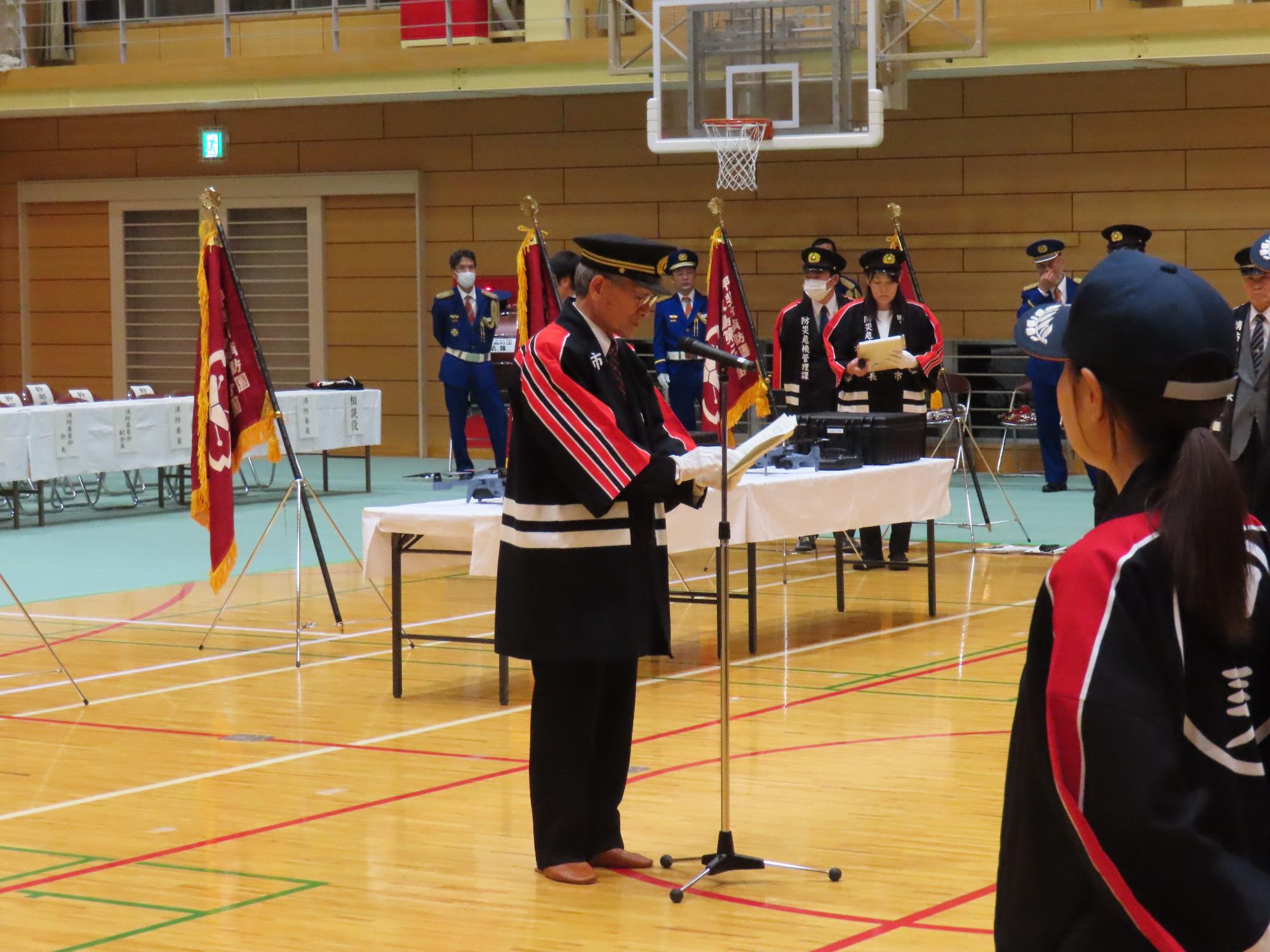R6甲斐市消防団入退団式の写真